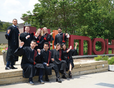 Group of graduates celebrating at Mohawk College