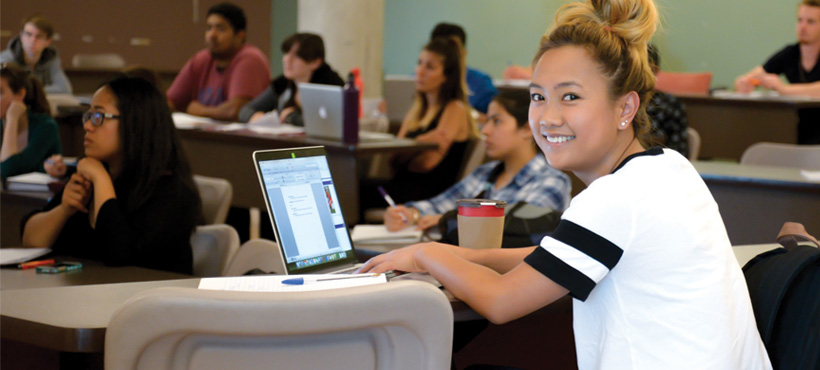 a student using her laptop