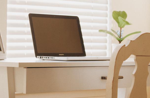 laptop on clean white desk