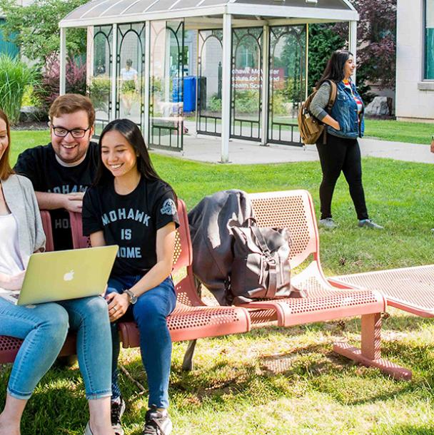 group of students studying outside of IAHS