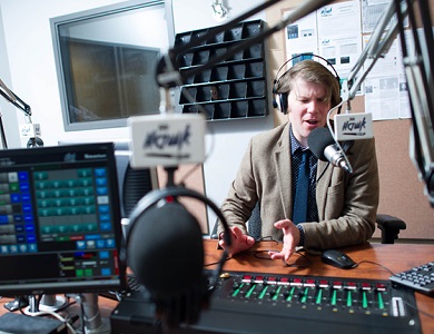 two people sitting in a chair