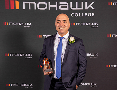 mohawk graduate receiving premier's award