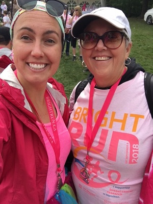"Two females dress for the Bright Run in Hamilton"