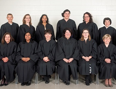 a group of Mohawk College graduates in convocation robes