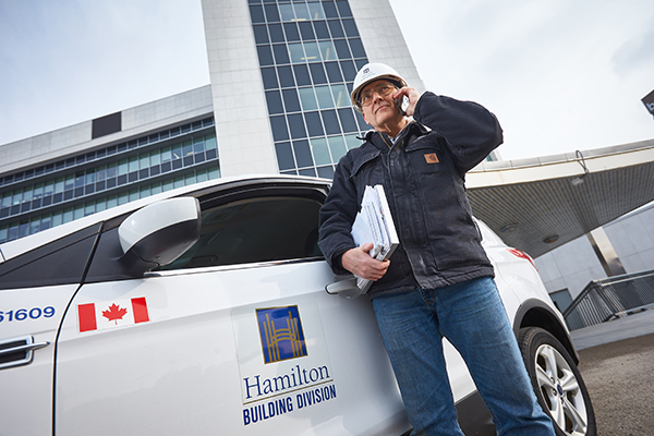 city of hamilton employee on their phone