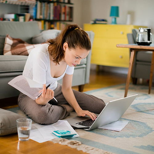 a young student working on her finances