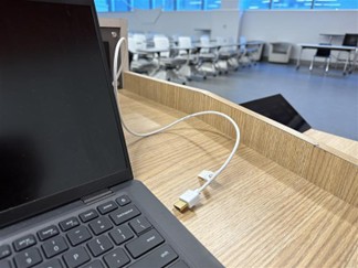Photo showing the location of an HDMI cable connected to the classroom podium