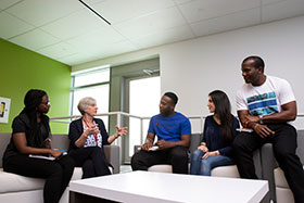 Professor talking with students