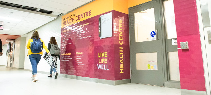 Students walking by the Health Centre at Mohawk's Fennell Campus