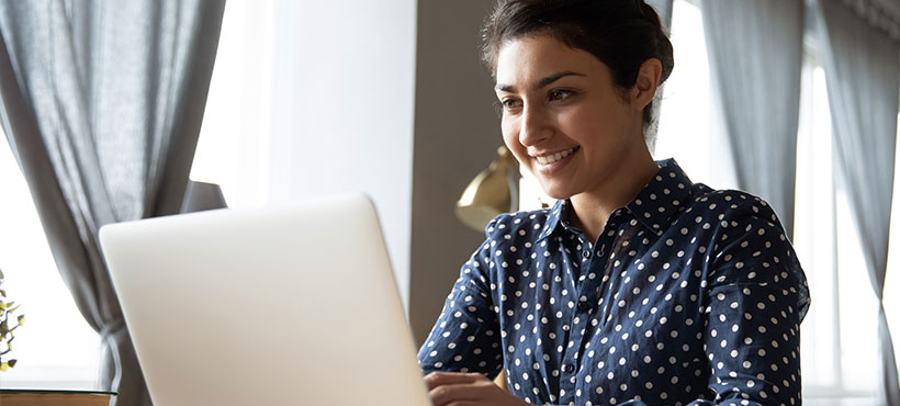 International student on a laptop