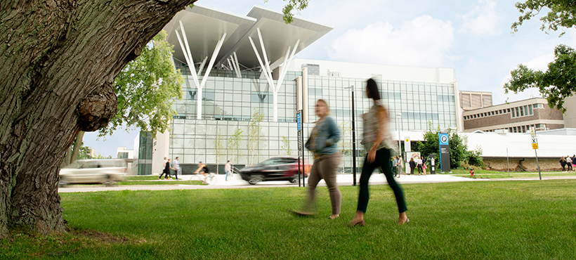 Students in front of the Joyce Centre for Partnership and Innovation