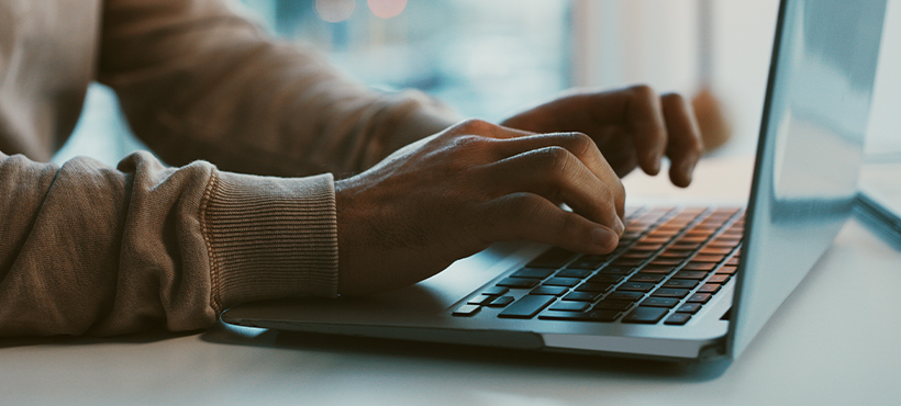 mohawk student accessing student service support on laptop