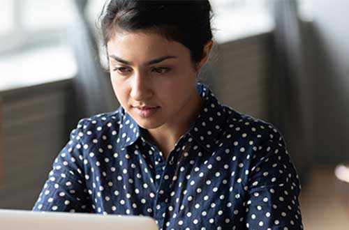 Student working on her laptop