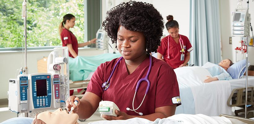 Nursing student in a lab