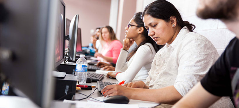 Office Administration students working in a mohawk computer lab