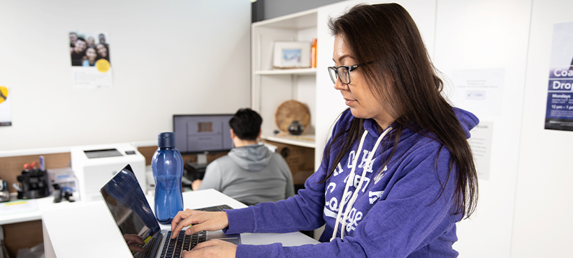 Student working on a laptop