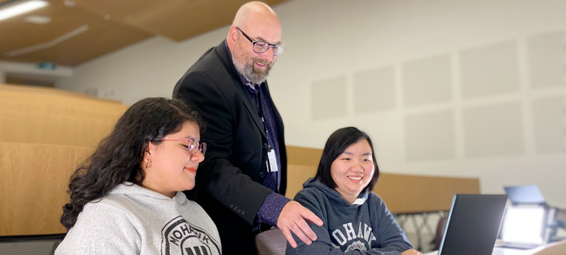 Two students learning from Mohawk College faculty