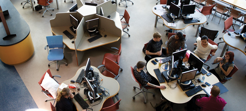 studnets sitting at computer desks