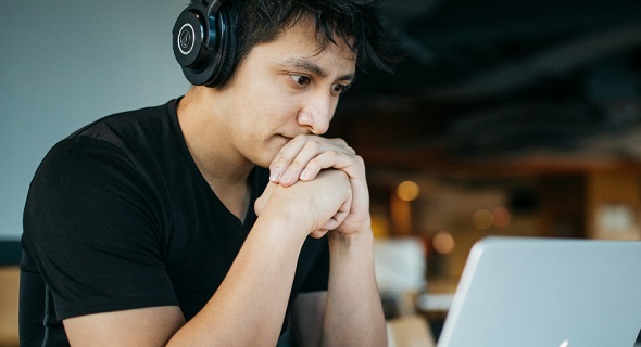 male workng on the computer