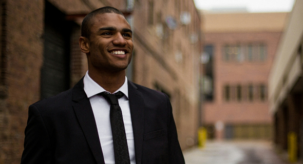 black man walking down the street