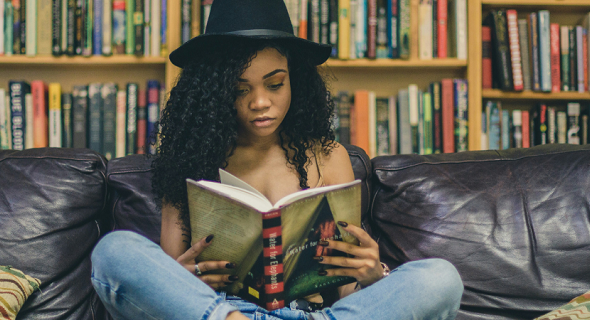 female relaxing and reading