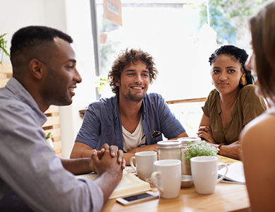 Group of friends having coffee