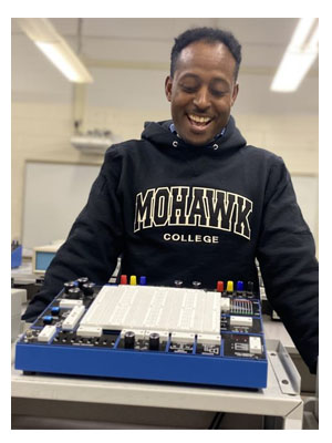 Ayalew, a university graduate, this meant pursuing the Electrical Engineering Technology program at Mohawk College