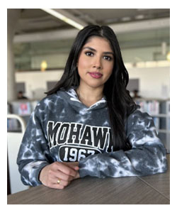 "Tanya sitting in the library"