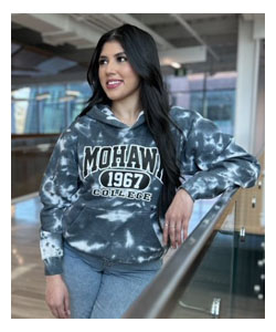 Tanya posing in a hallway