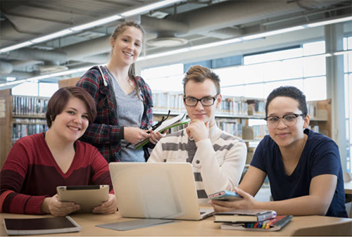 Students gathered in a library