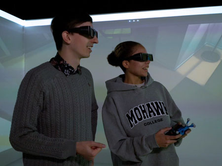 Faculty and student in the VR lab