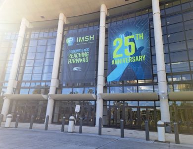Exterior of Conference Building with massive banners hanging that display the 'IMSH 2025' themes