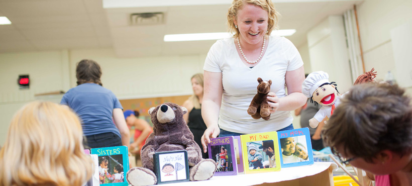 mohawk student practicing child care in a simulated school environment