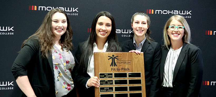 Mohawk College Students with Fit-2-Pitch plaque