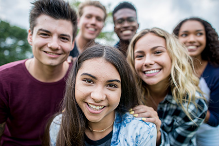 group of smiling high school students.jpg