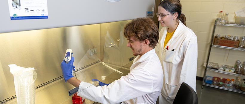 Two students working in the biotech lab