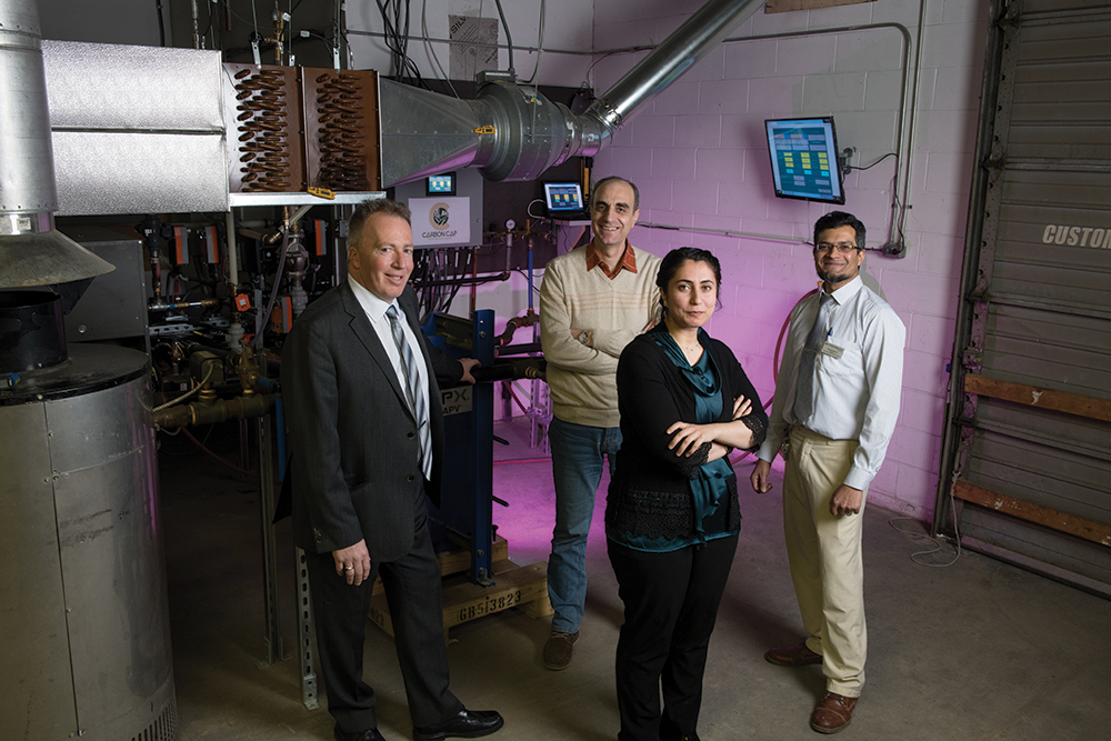 Research team and Carbon Cap team photographed in front of Flue Gas Recirculation System