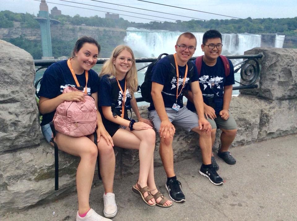4 Explore students sitting near Niagara Falls