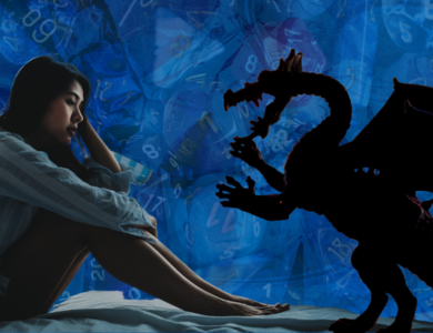 Girl holding head facing shadow of a dragon