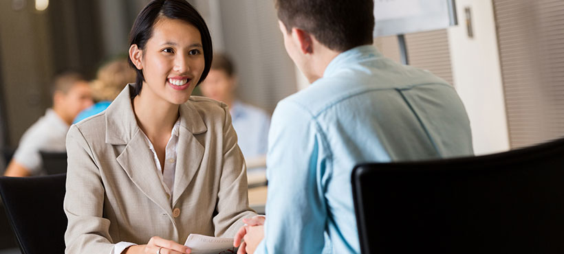 Student and employer at a career fair