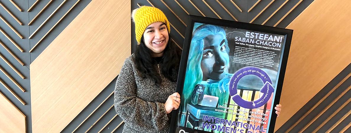 Stef holding her portrait