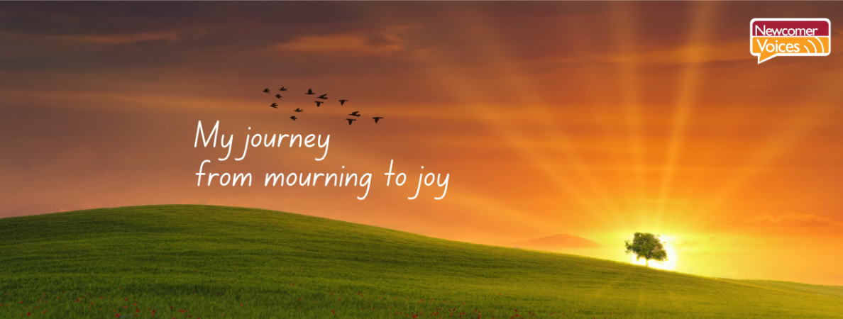 Banner with an image of a hill, a tree in the distance and the sunrise behind the tree