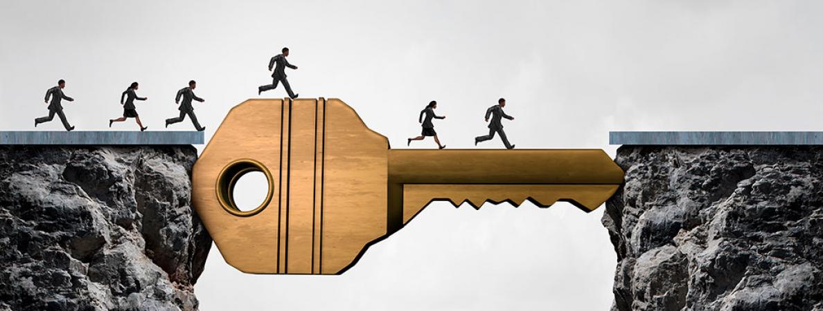 People running across a bridge that looks like a key.