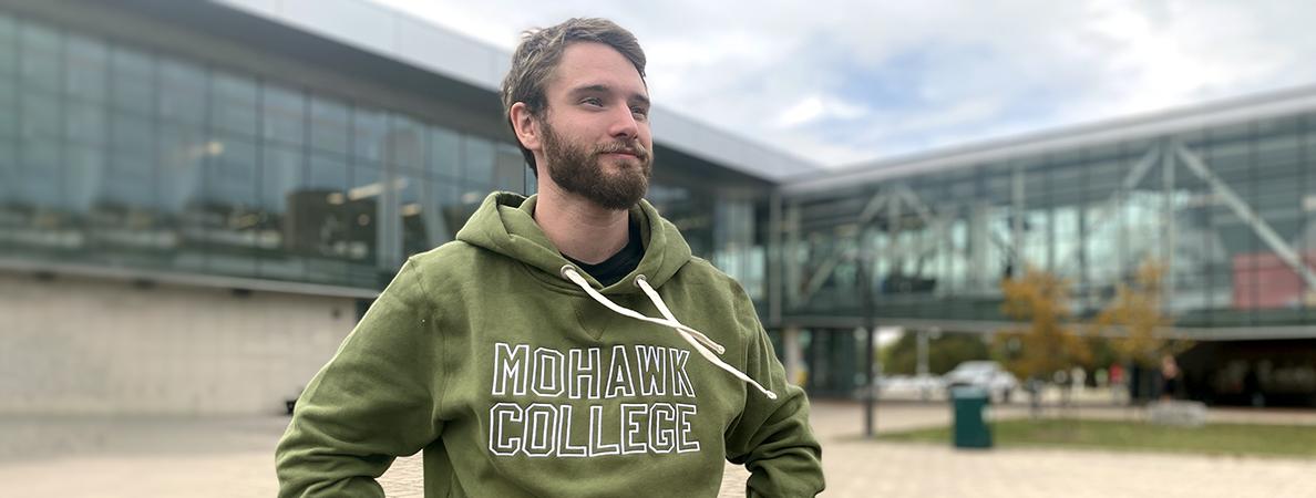 Calum standing in the MSA Plaza