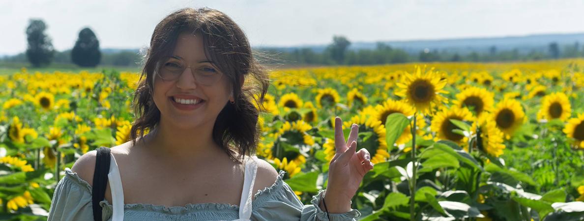 Jovana in a sunflower field