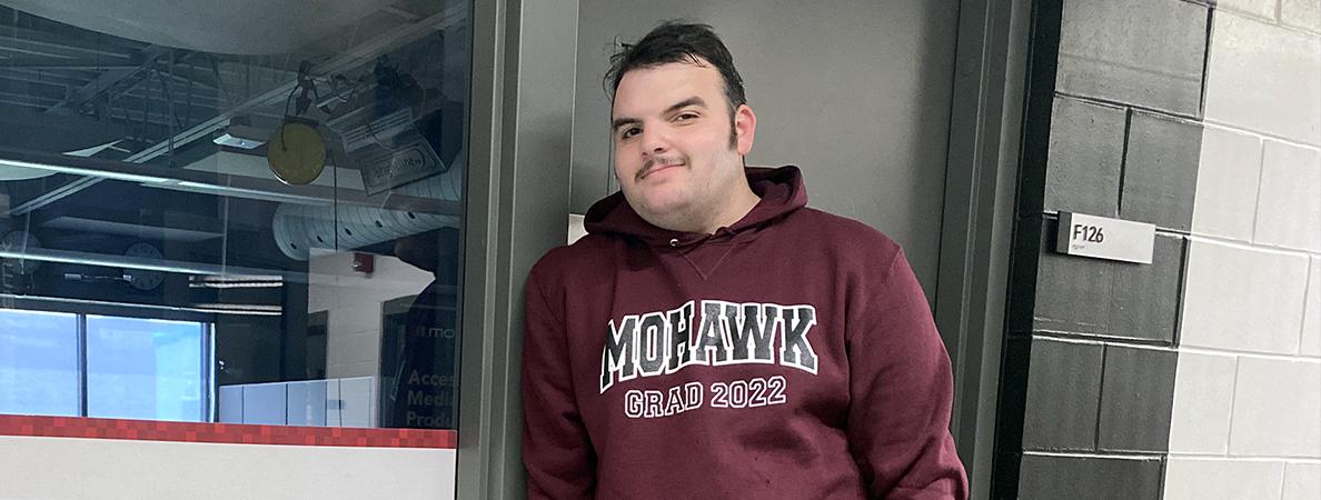 Matt standing in front of Journlism lab