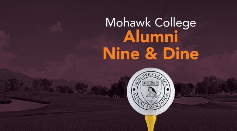 Golf ball with alumni association crest on tee