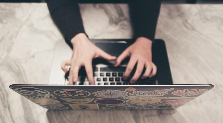 Someone working on the computer