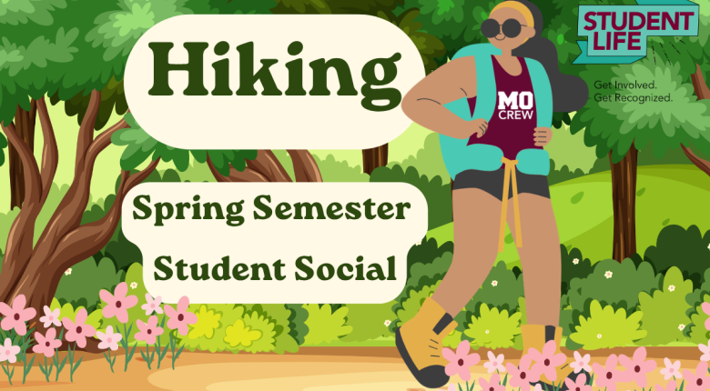 person in a MoCrew shirt and backpack hiking on a flowered trail