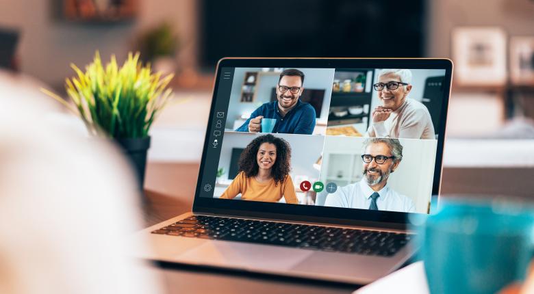 Four people on a computer screen